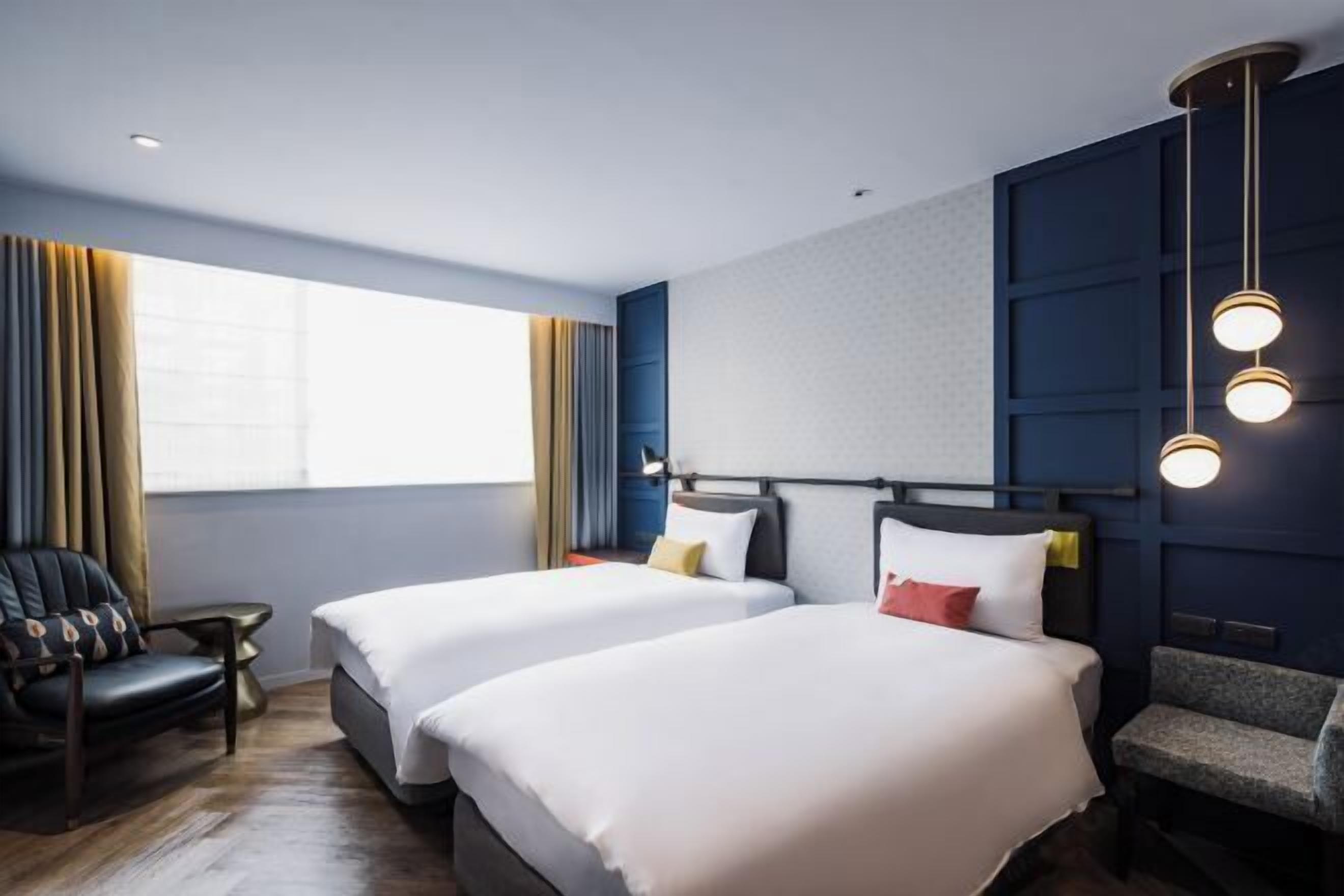 Premium bedding, down comforters, in-room safe, individually decorated