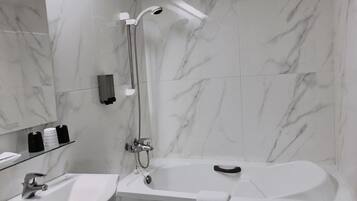 Combined shower/bathtub, deep-soaking bathtub, rainfall showerhead