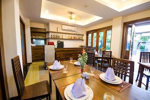 Breakfast, lunch, dinner served; international cuisine, pool views