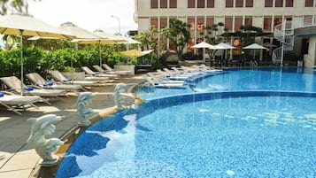 Outdoor pool, pool umbrellas, sun loungers