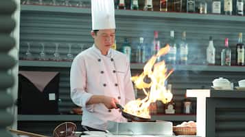 Breakfast, lunch, dinner served; international cuisine, pool views