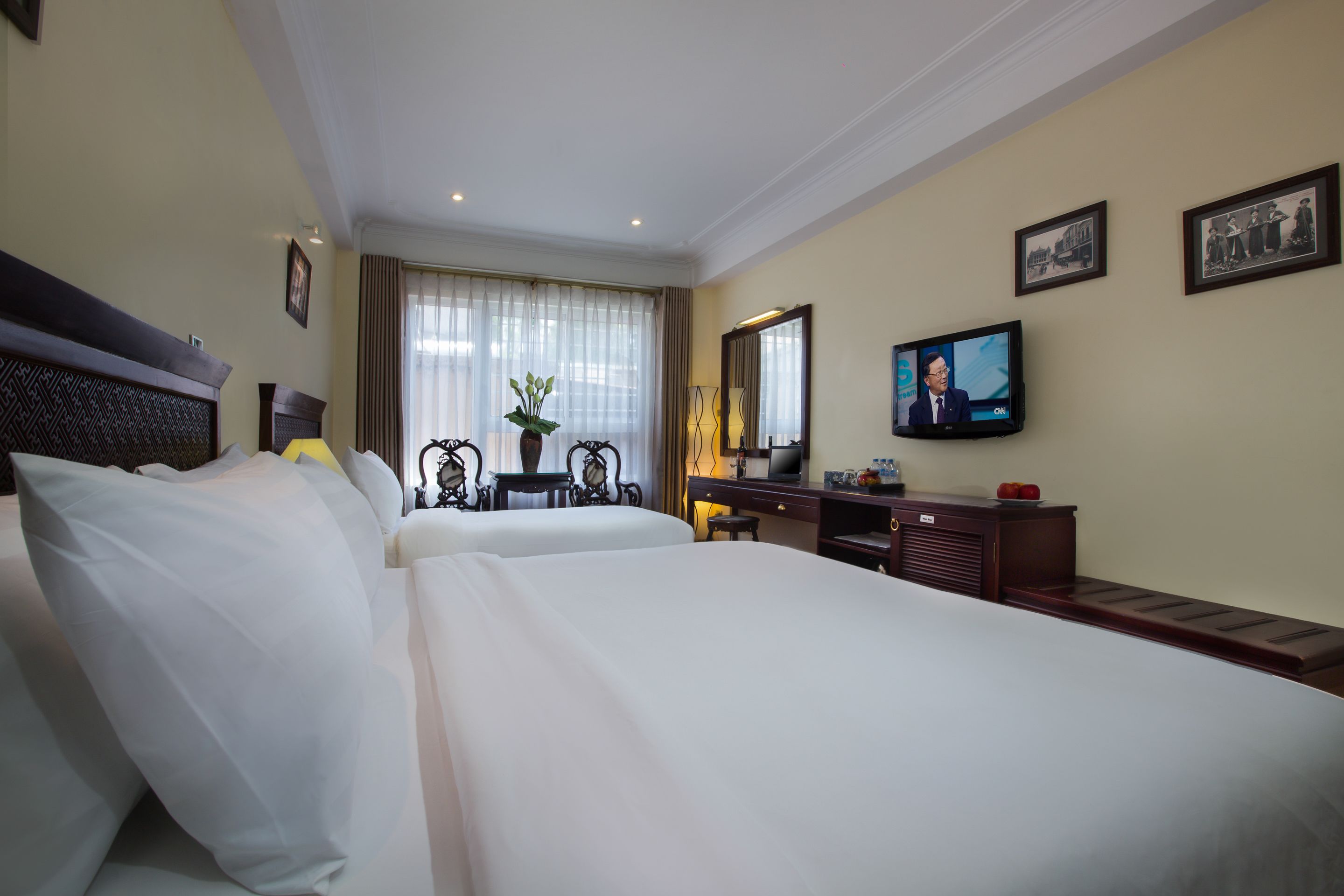 family room | 1 bedroom, minibar, in-room safe, desk