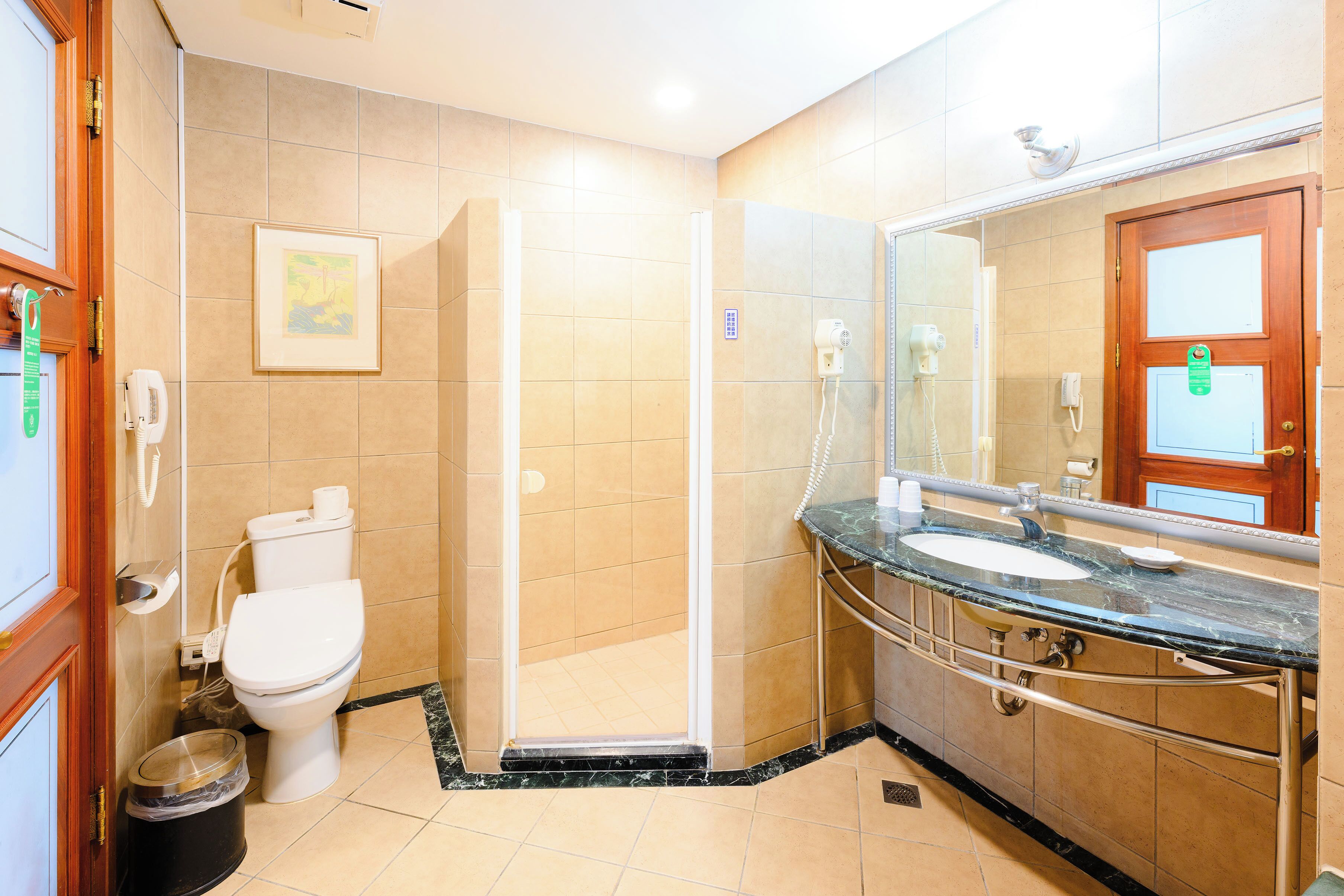 standard quadruple room, 2 double beds | bathroom | rainfall showerhead, free toiletries, hair dryer, slippers