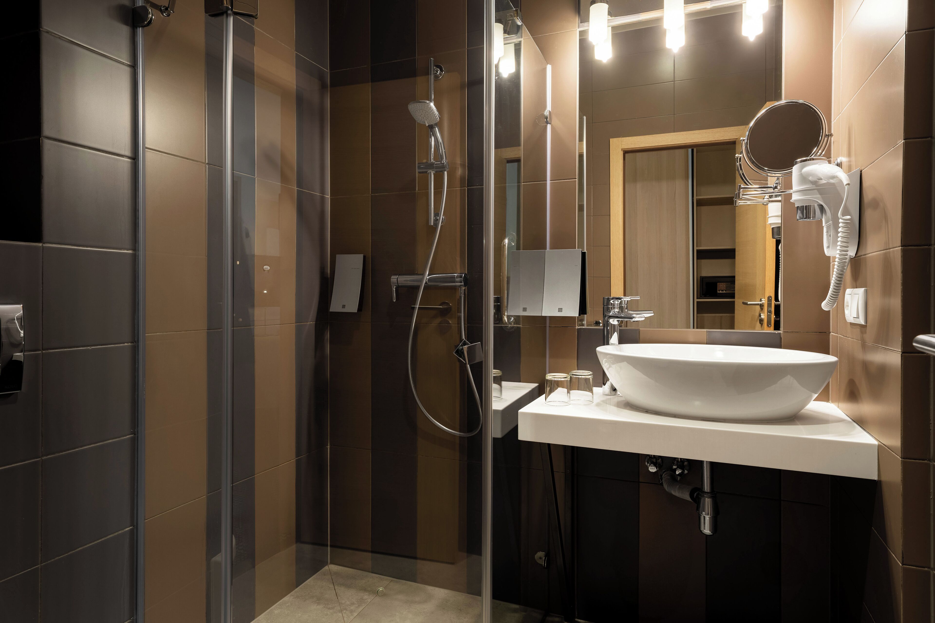 hydromassage showerhead, hair dryer, heated floors, towels