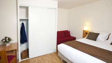 Premium bedding, desk, soundproofing, iron/ironing board