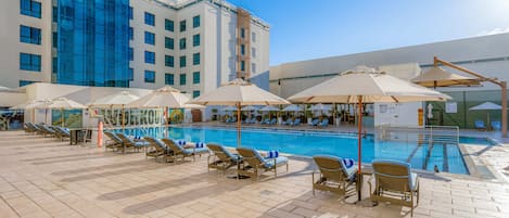 Outdoor pool, open 6:00 AM to 10:00 PM, pool umbrellas, pool loungers