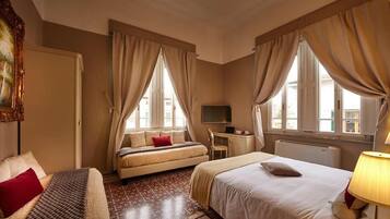 Quadrupla Executive | 1 camera, copriletto in piuma, minibar, una cassaforte in camera