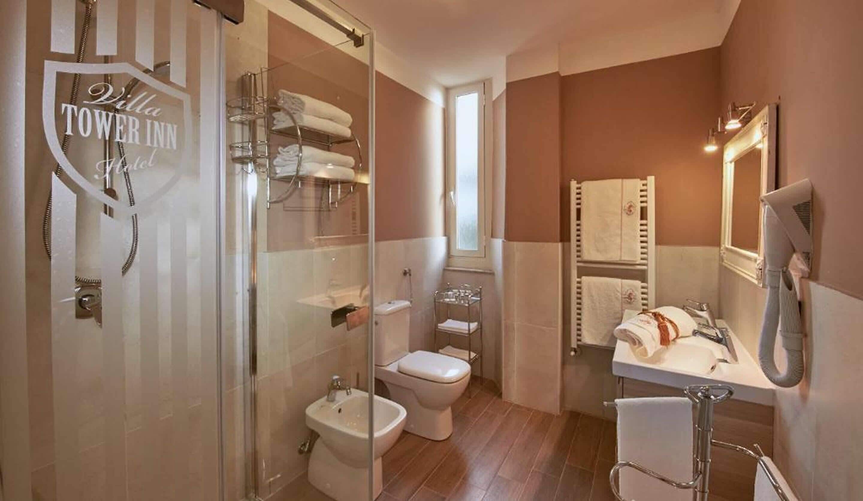 executive triple room | bathroom | shower, rainfall showerhead, free toiletries, bidet