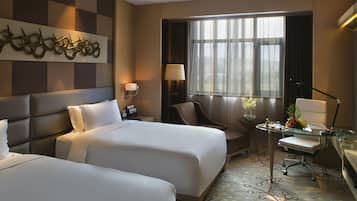 Premium bedding, down duvets, pillow-top beds, minibar