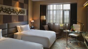 Premium bedding, down duvets, pillow-top beds, minibar