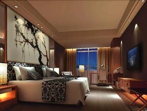 Luxe beddengoed, donsdekens, pillowtop-bedden, een minibar