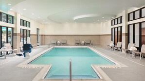 A large indoor swimming pool with a 3-foot depth marker, surrounded by lounge chairs and a tiled floor. - Hampton Inn & Suites Chattanooga/Hamilton Place (Chattanooga)
