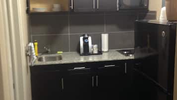 Fridge, microwave, coffee/tea maker, paper towels