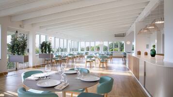 Breakfast, lunch, dinner served; local cuisine, al fresco dining