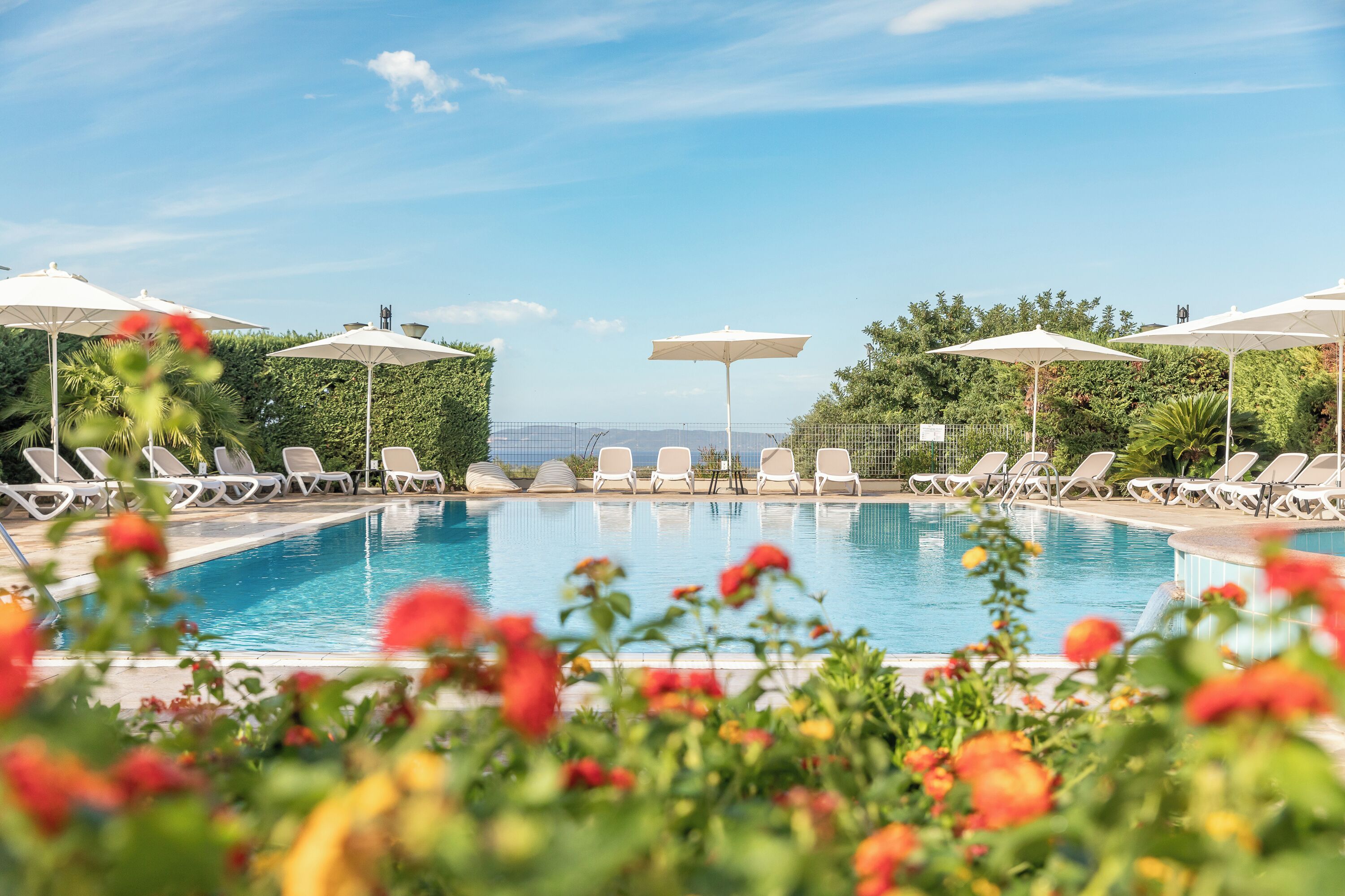 Seasonal outdoor pool, pool umbrellas, sun loungers