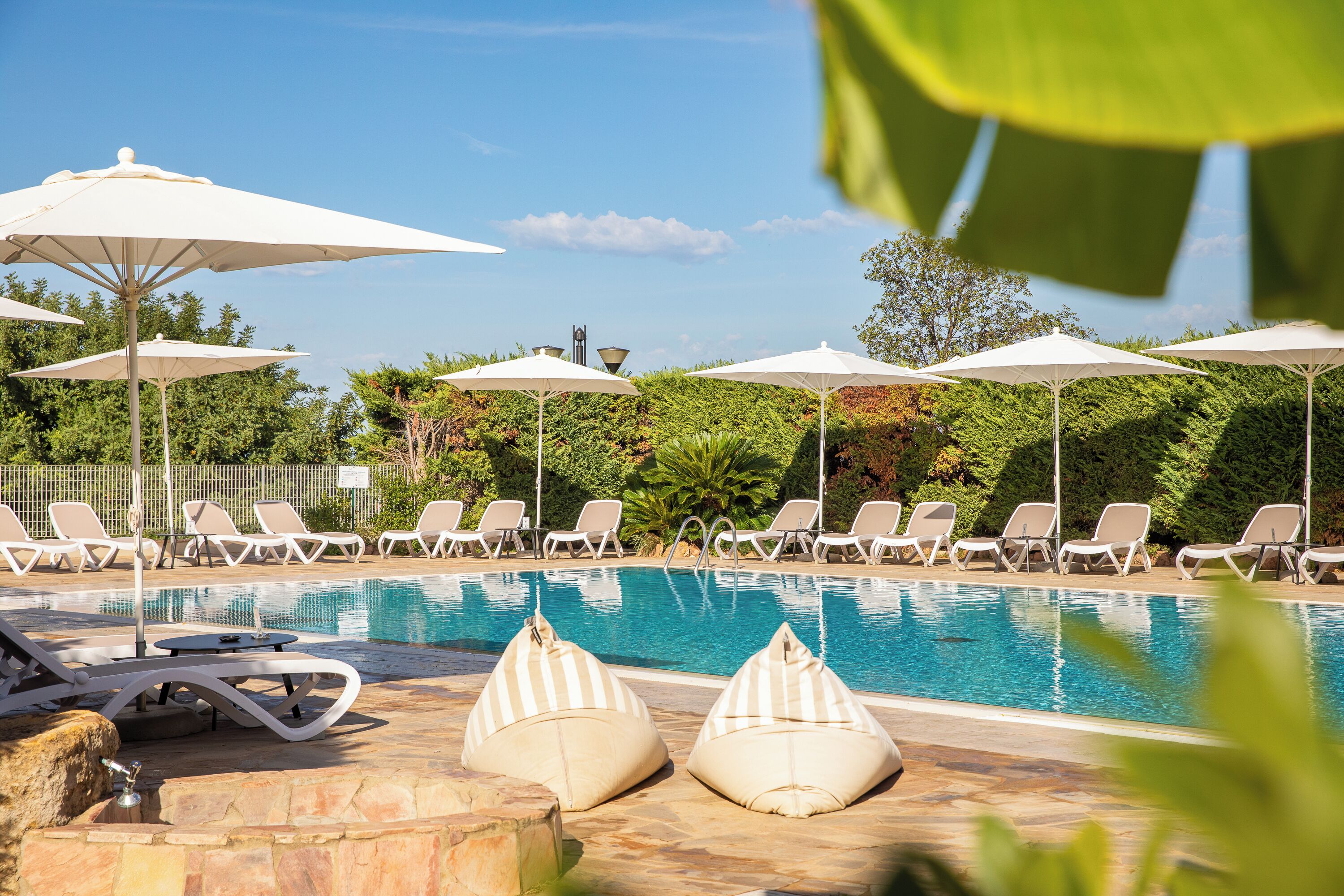 Seasonal outdoor pool, pool umbrellas, sun loungers
