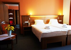 Family Quadruple Room | Bathroom | Combined shower/tub, free toiletries, slippers, towels