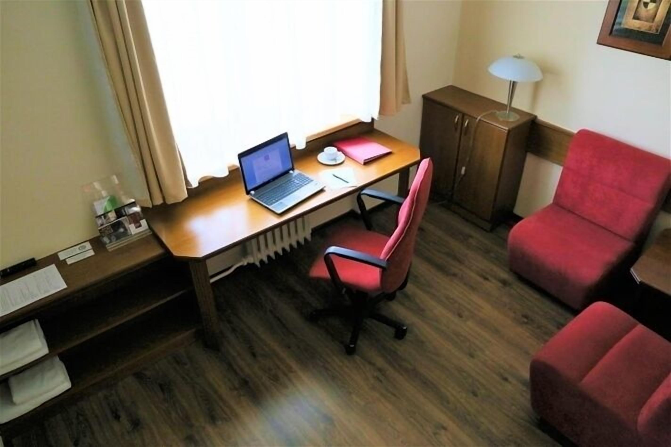 apartment | desk, blackout curtains, soundproofing, rollaway beds