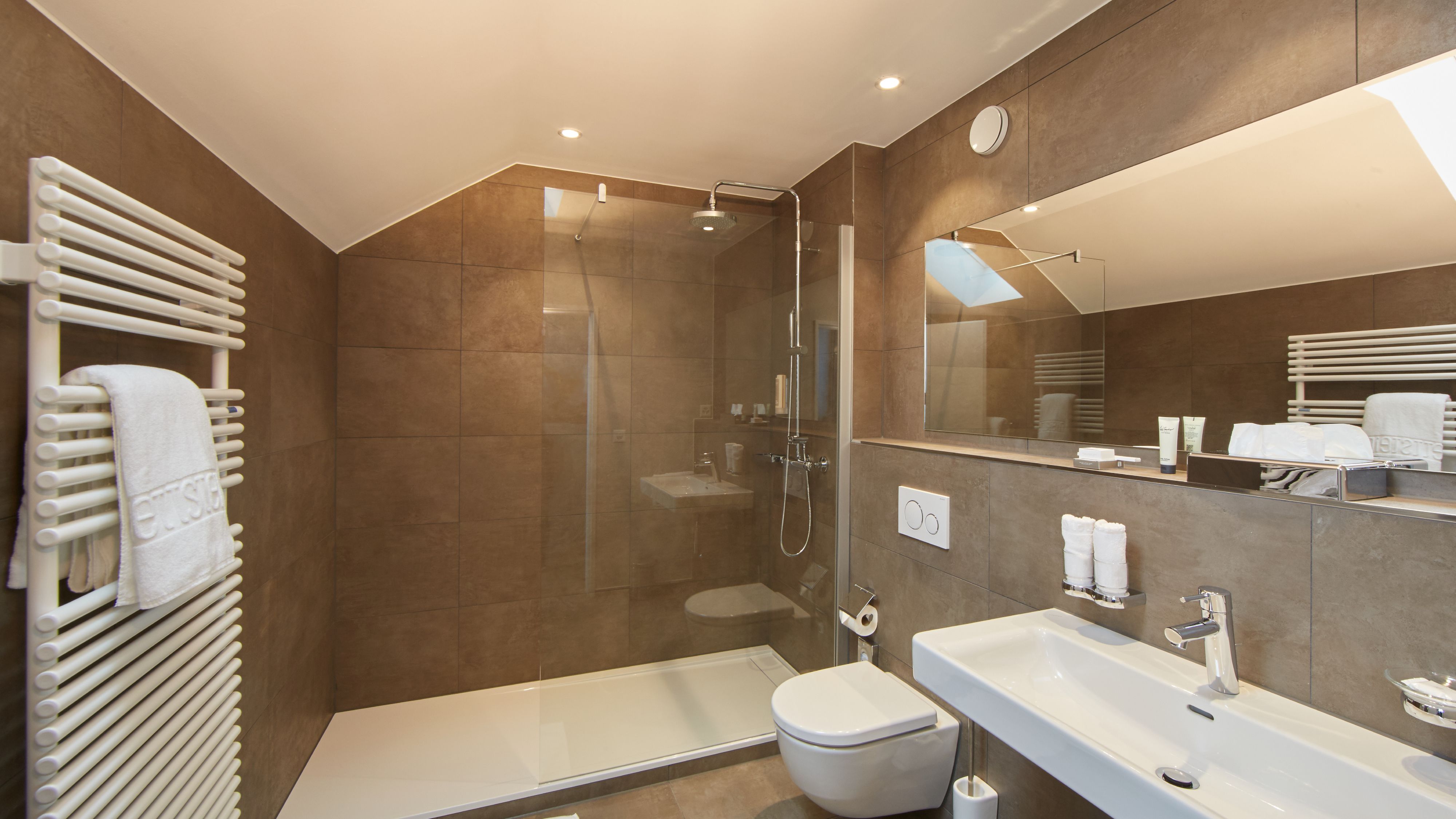 rainfall showerhead, free toiletries, hair dryer, slippers