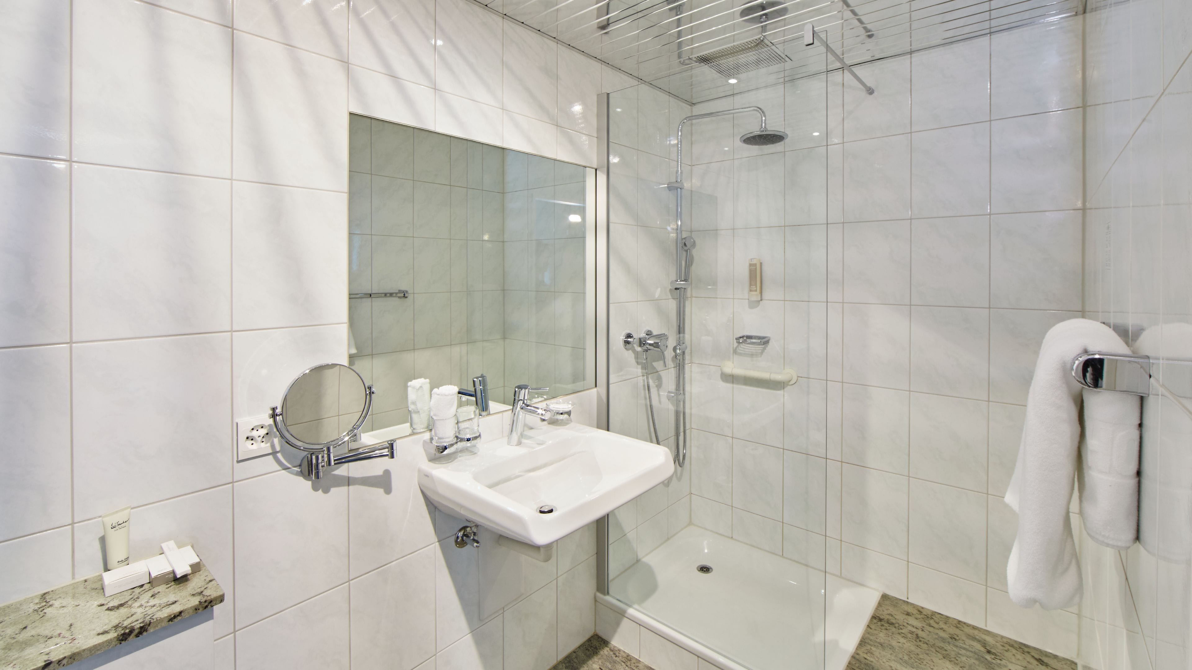 rainfall showerhead, free toiletries, hair dryer, slippers