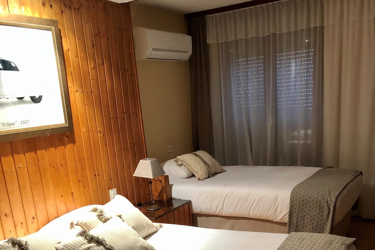 Family Triple Room | Desk, iron/ironing board, free WiFi, bed sheets