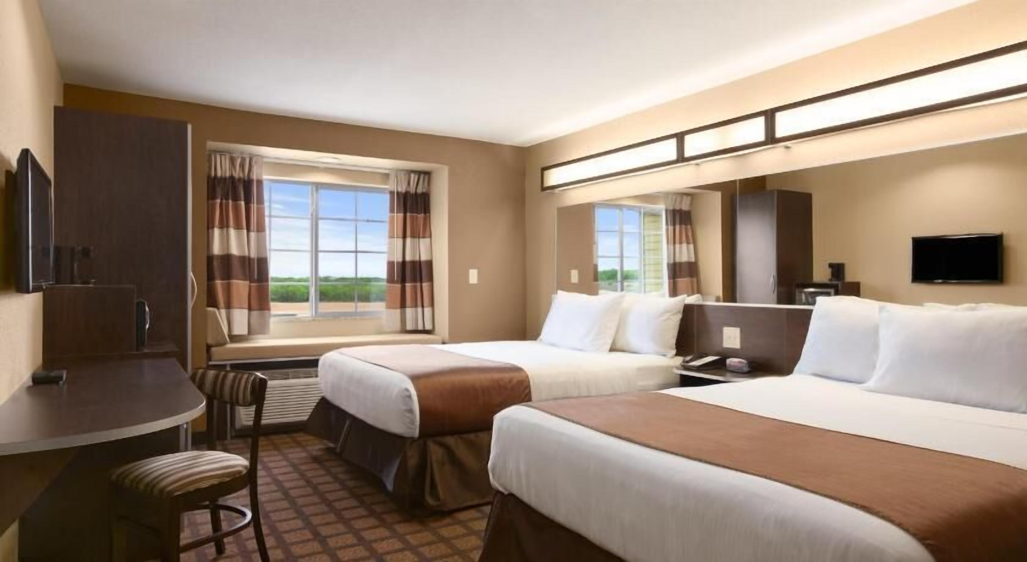 Hypo-allergenic bedding, pillowtop beds, in-room safe, desk