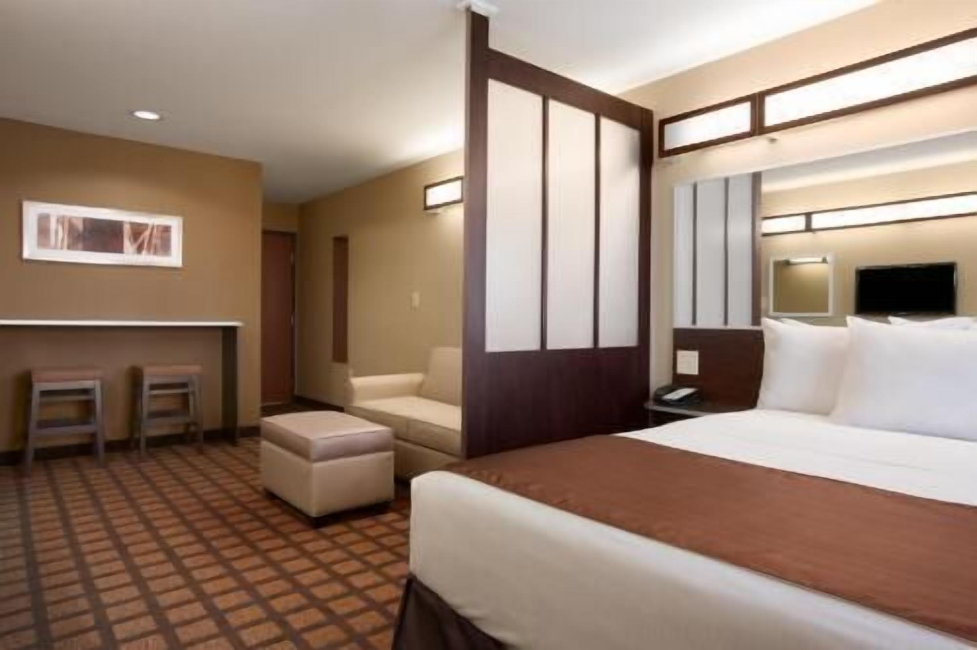 Hypo-allergenic bedding, pillowtop beds, in-room safe, desk