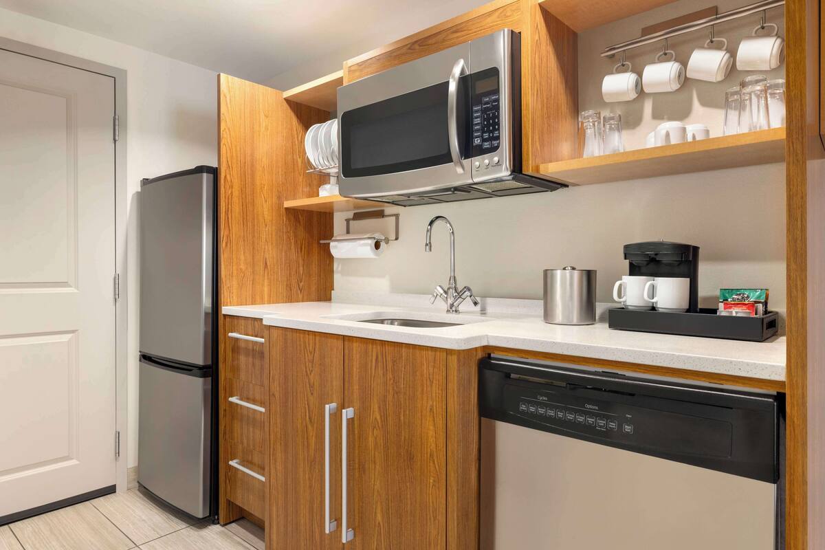 studio, 1 queen bed | private kitchen | full-sized fridge, microwave, dishwasher, coffee/tea maker