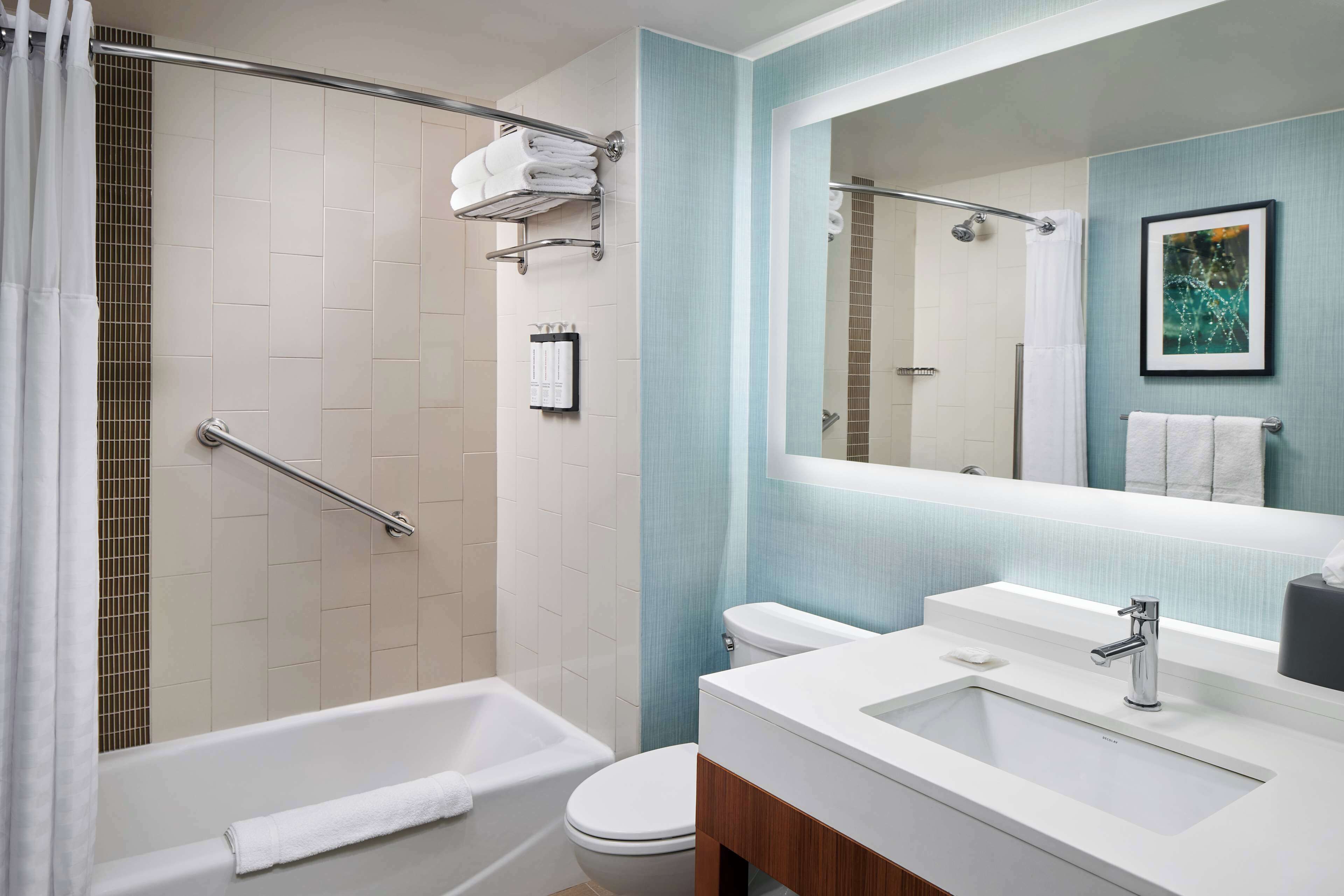 room, 2 queen beds | bathroom | designer toiletries, hair dryer, towels