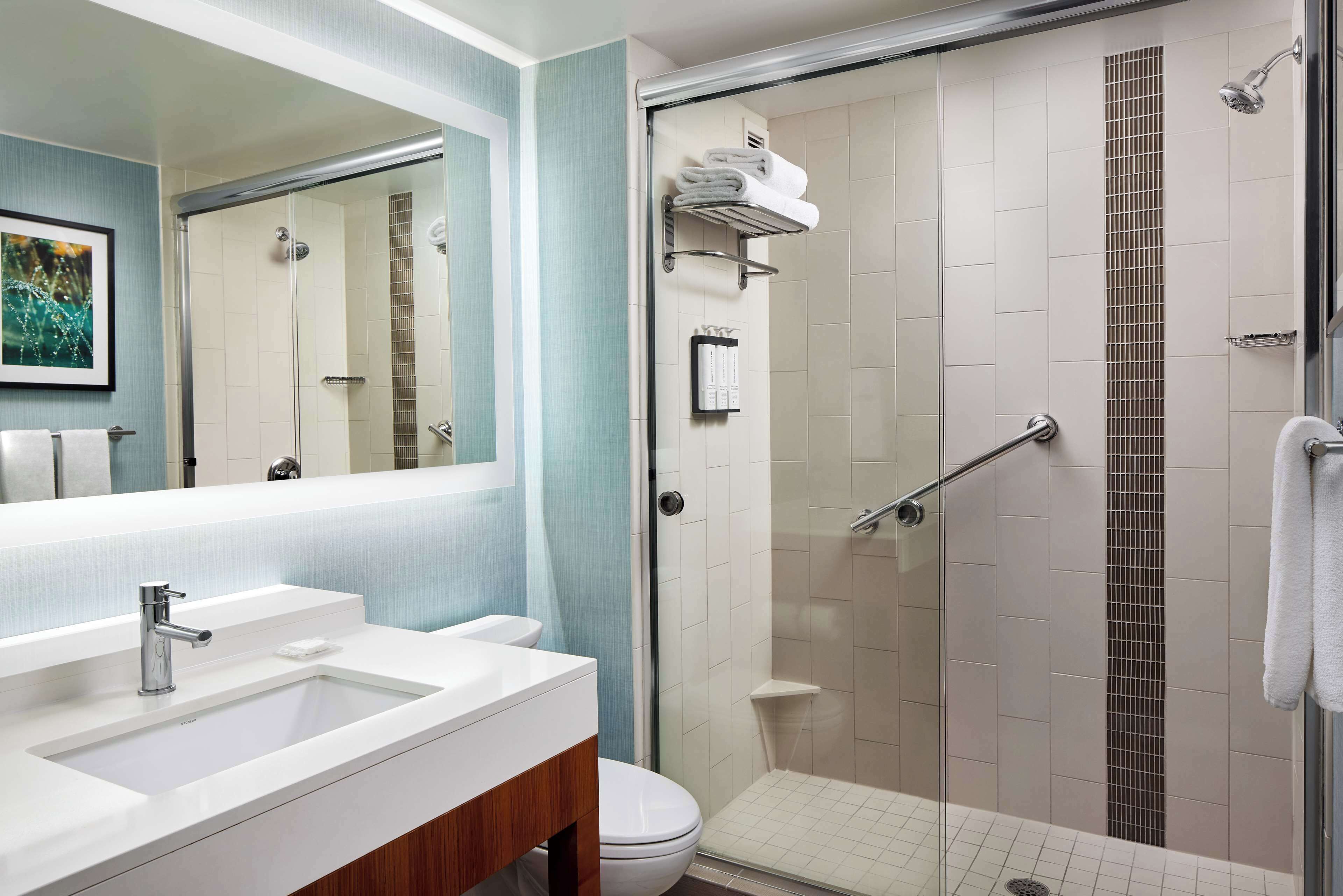 room, 1 king bed | bathroom | designer toiletries, hair dryer, towels