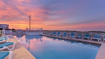 Seasonal outdoor pool, pool loungers