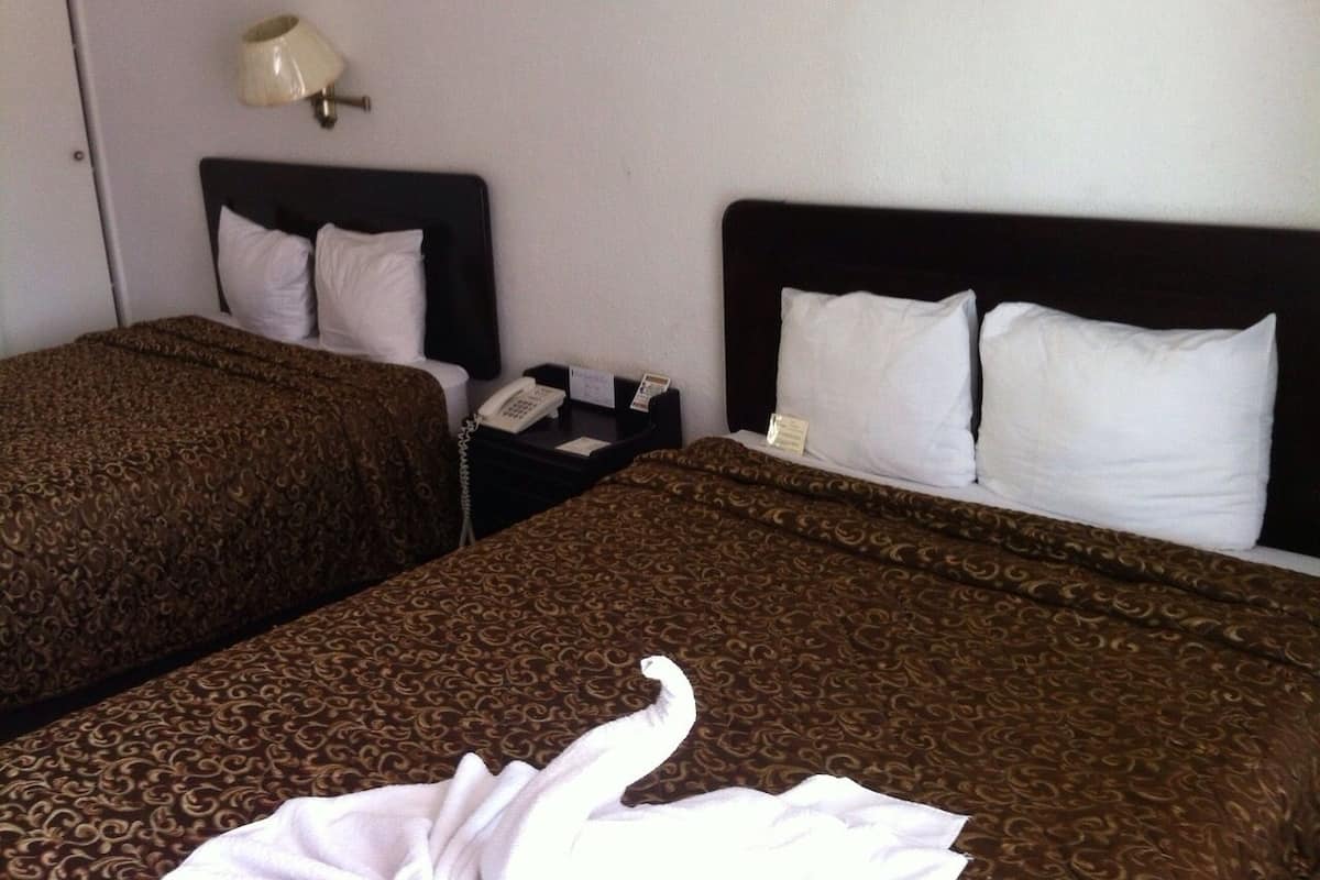 Hypo-allergenic bedding, down comforters, pillowtop beds, minibar