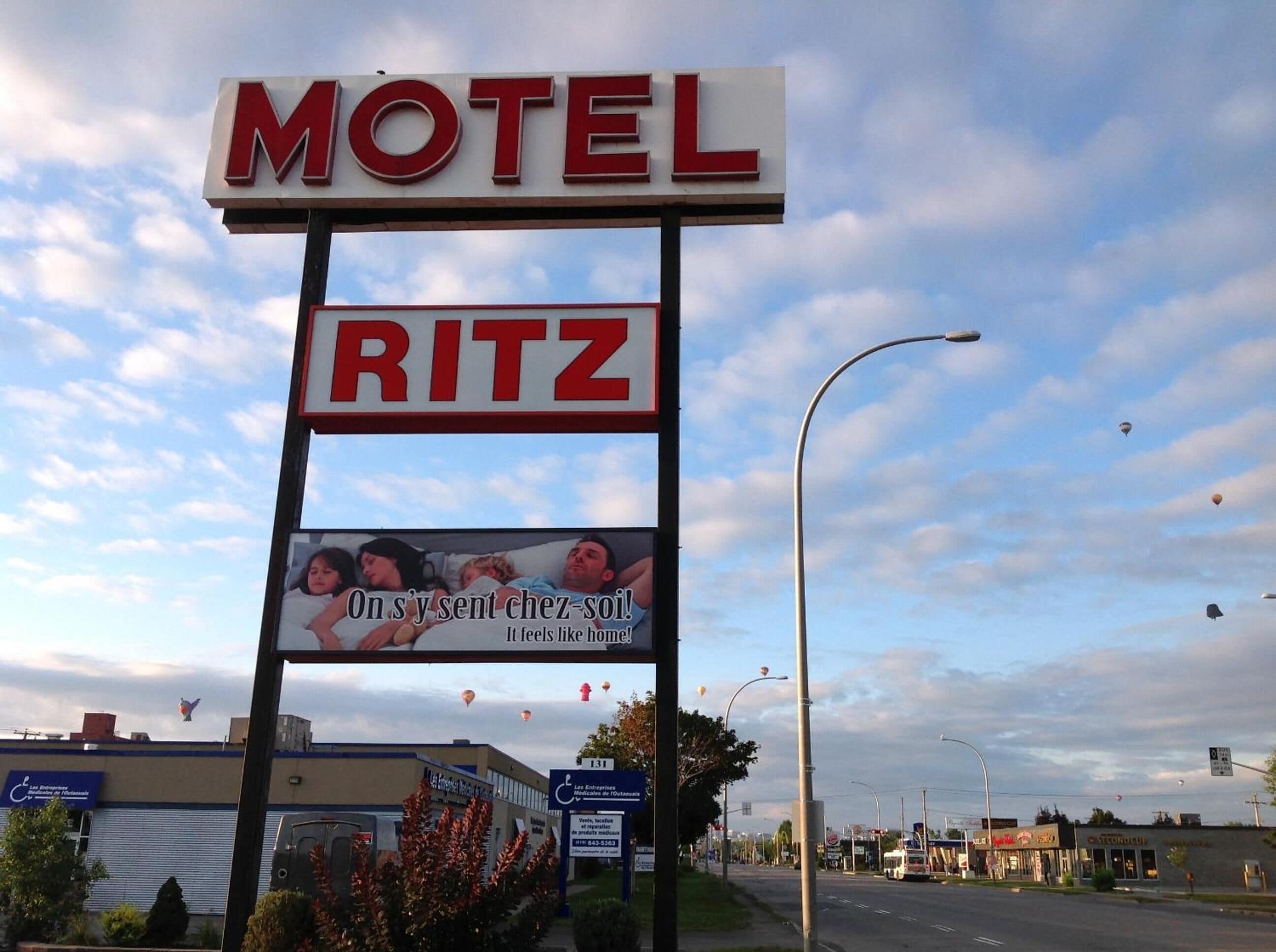 A motel sign with the name 'MOTEL RITZ'.