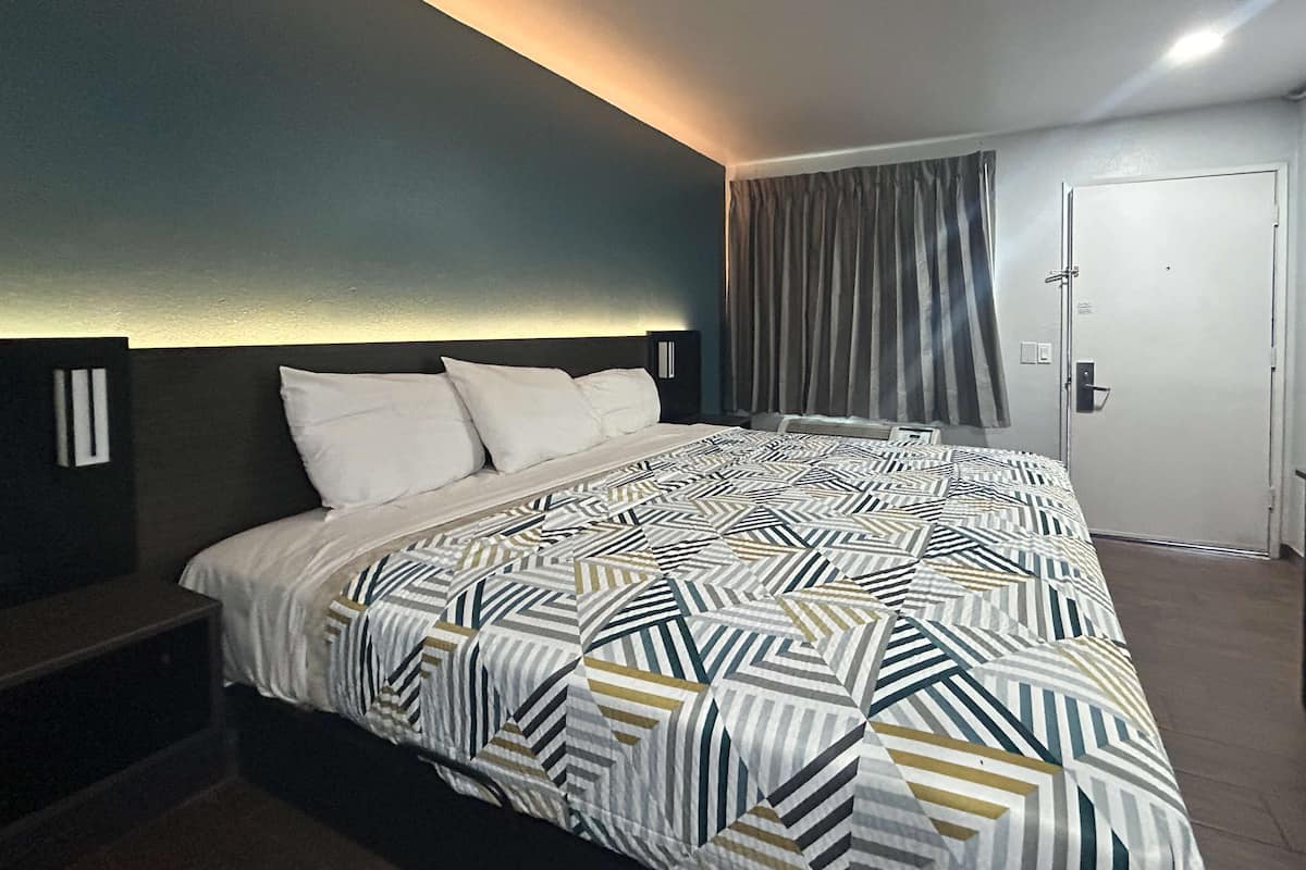 Desk, blackout curtains, free WiFi, bed sheets