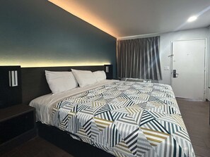 Escrivaninha, cortinas blackout, Wi-Fi de cortesia, roupa de cama