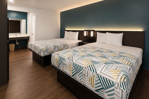 Desk, blackout drapes, WiFi (free), bed sheets