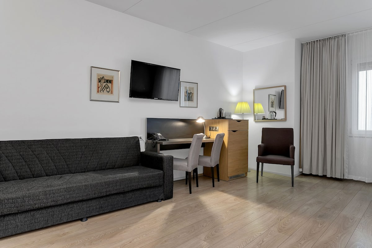 family quadruple room | desk, laptop workspace, blackout curtains, iron/ironing board