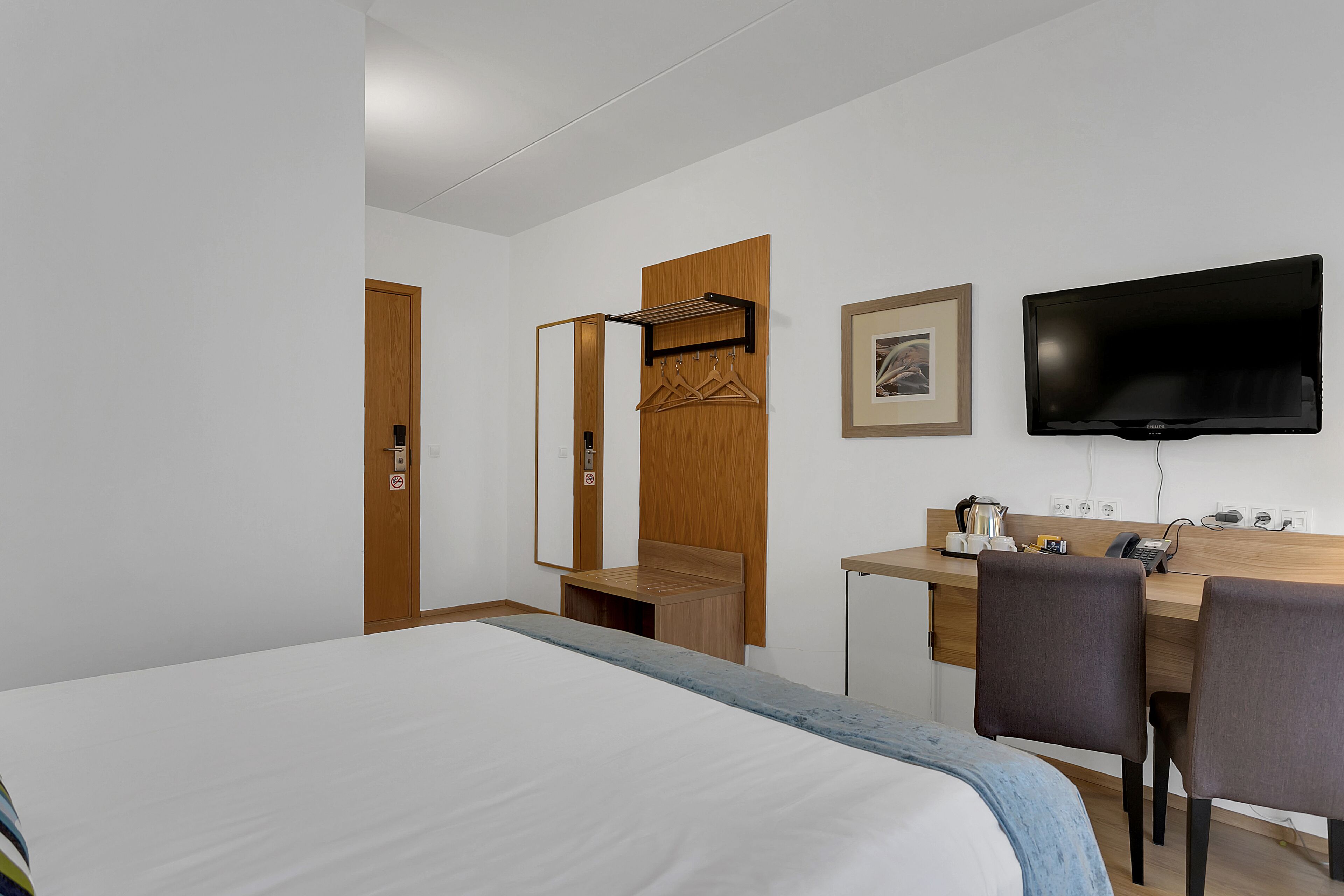 standard triple room | desk, laptop workspace, blackout curtains, iron/ironing board