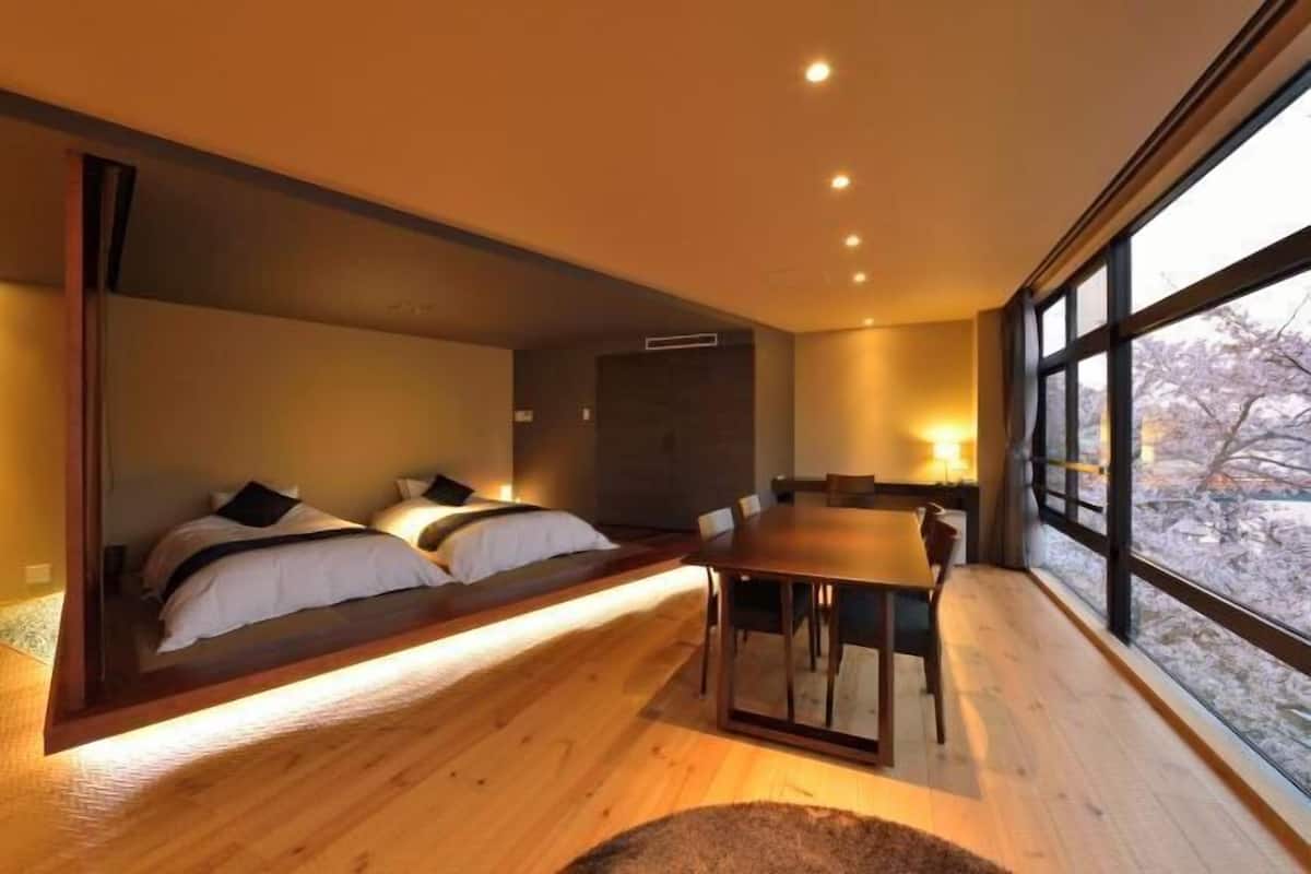 Premium bedding, down duvets, in-room safe, desk