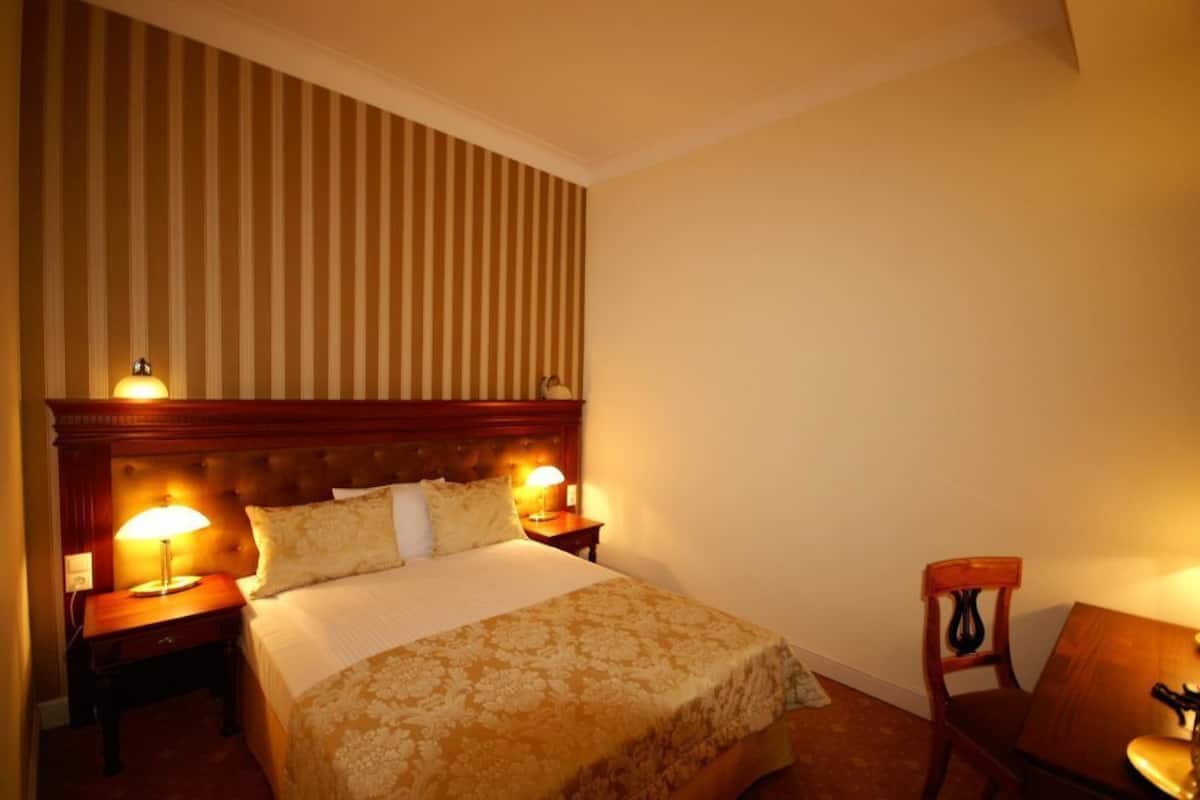 Ropa de cama de alta calidad y minibar