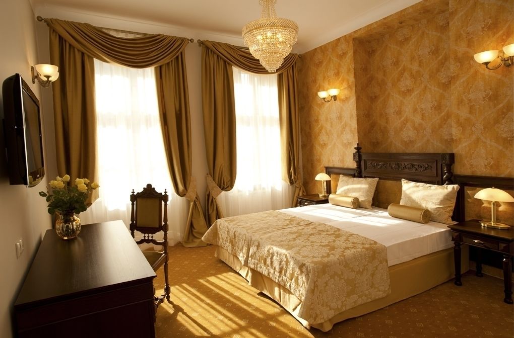 deluxe room | premium bedding, minibar, in-room safe, individually decorated