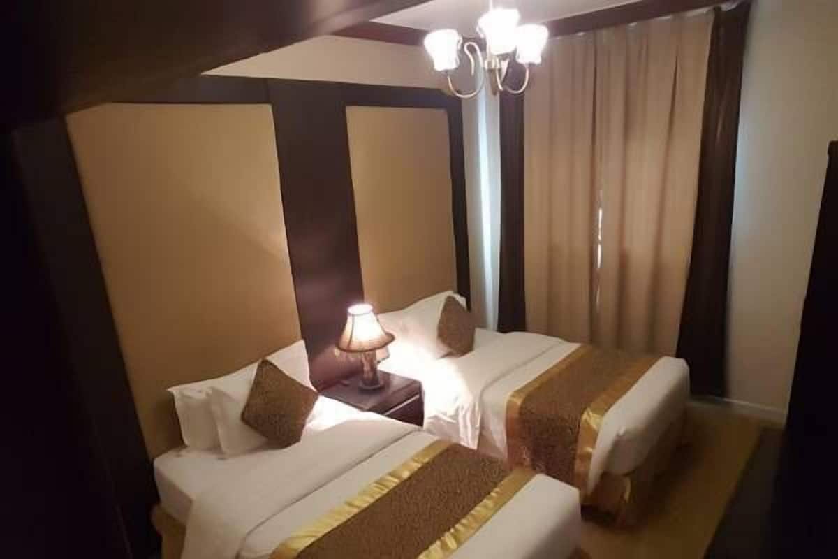 Suite, 2 Bedrooms (With 2 Bathrooms) | Minibar, in-room safe, soundproofing, iron/ironing board