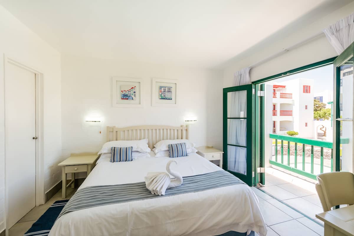 Village 2 Bedroom Kaliva | 1 bedroom, in-room safe, individually decorated, individually furnished