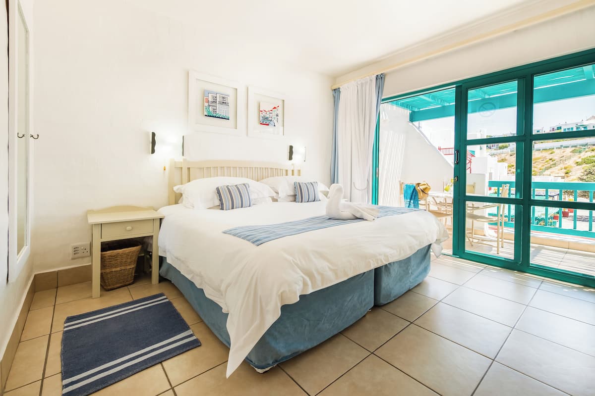 Agora Square 1 Bedroom Kaliva | 1 bedroom, in-room safe, individually decorated, individually furnished