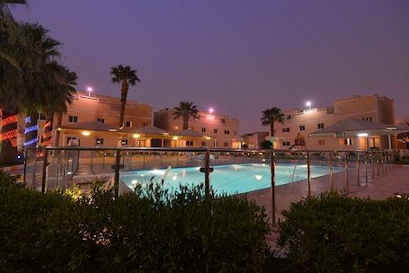 Outdoor pool, pool umbrellas, sun loungers