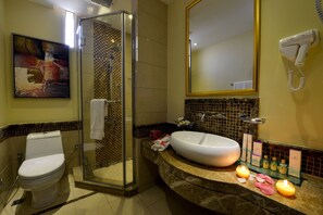 Shower, free toiletries, hair dryer, towels