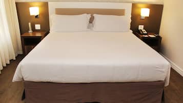 Hypo-allergenic bedding, pillow-top beds, minibar, in-room safe