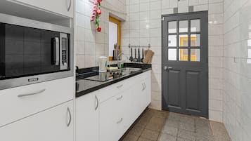 Departamento Confort, vista a la colina | Cocina privada
