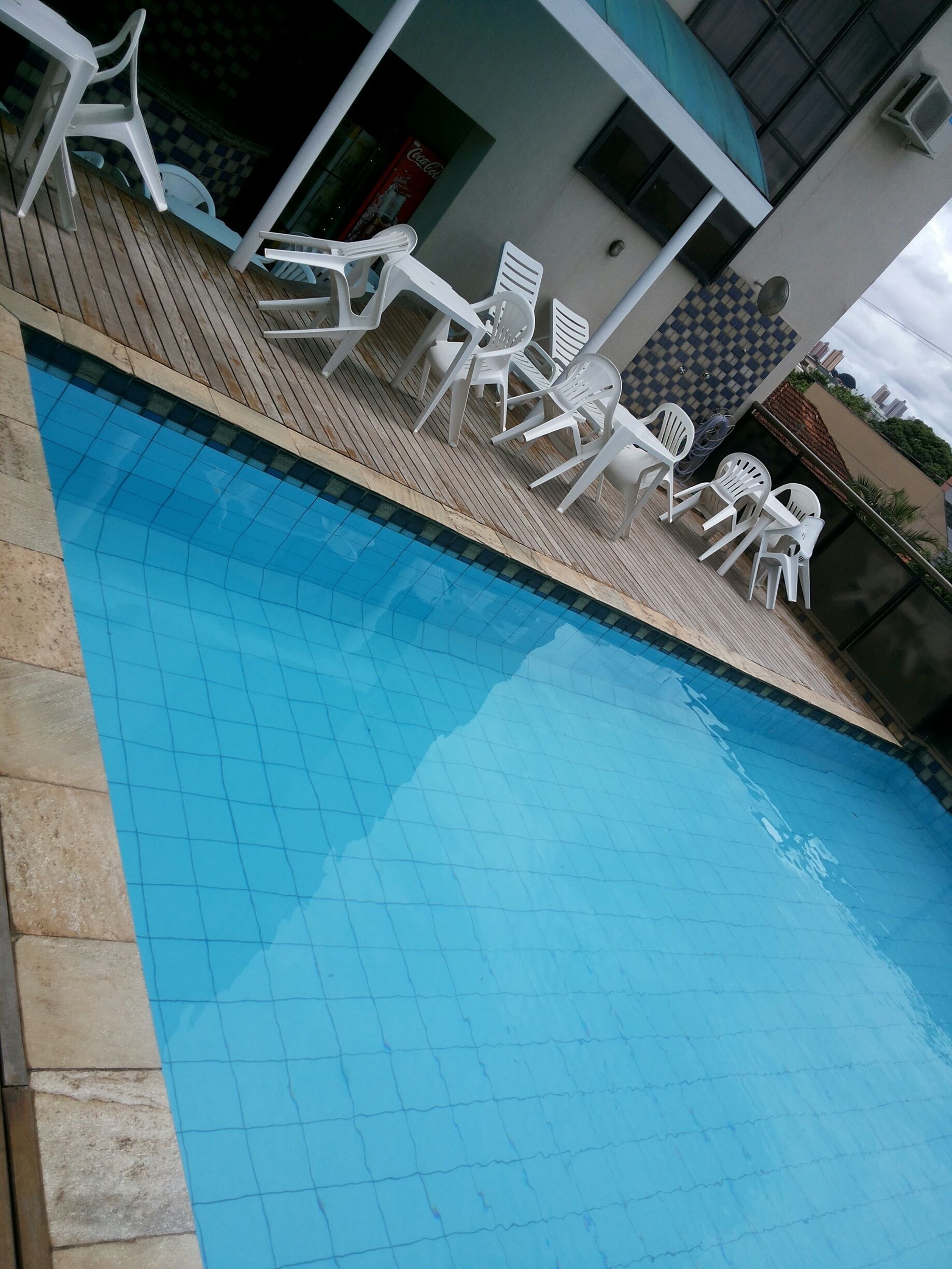 outdoor pool, open 9:00 am to 5:00 pm, pool loungers