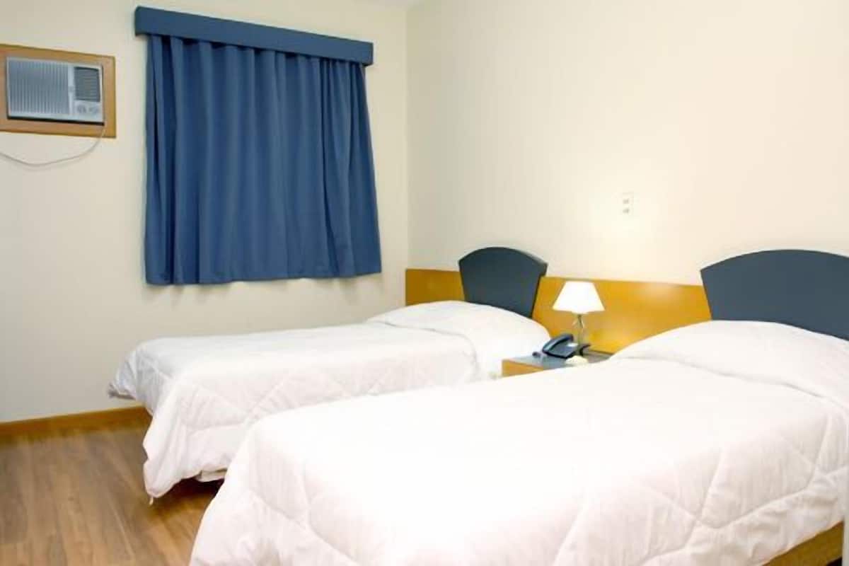Luxe beddengoed, donzen dekbedden, pillowtop-bedden, een minibar